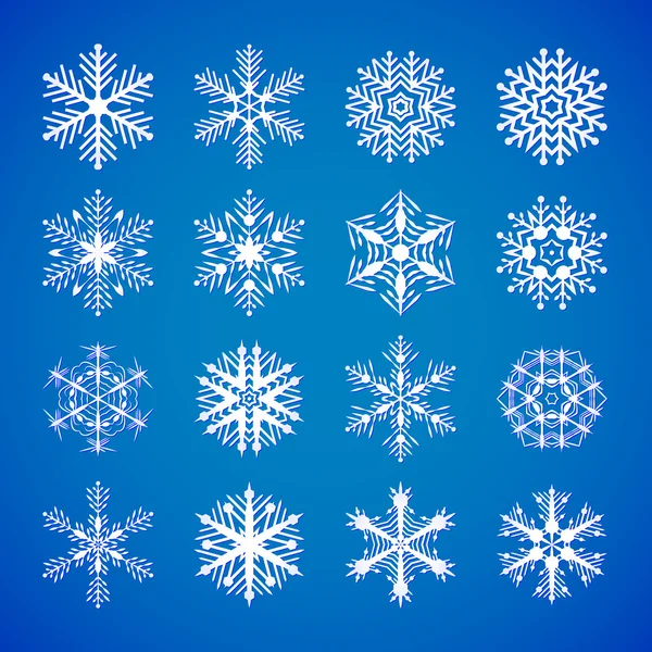 Conjunto de copos de nieve blancos sobre azul — Vector de stock