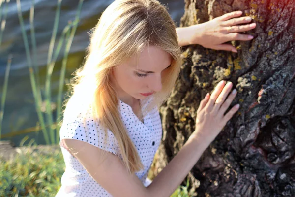 Young Pensive Caucasian Girl White Dress Polka Dots Blonde Sitting — Photo