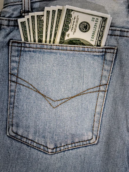 Dólares no seu bolso . — Fotografia de Stock