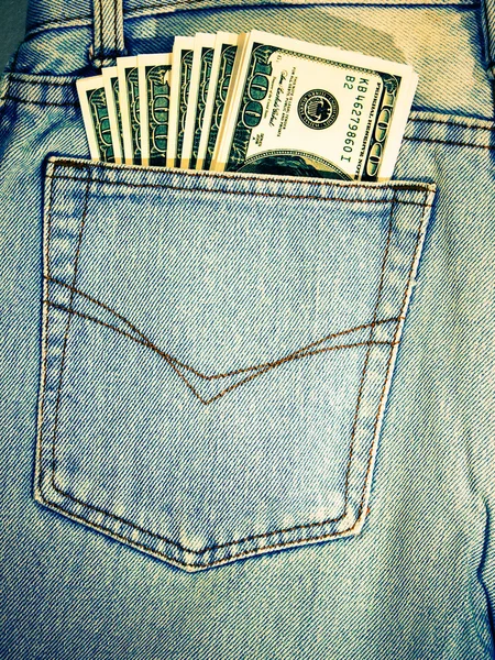 Vintage dollar in je zak. — Stockfoto