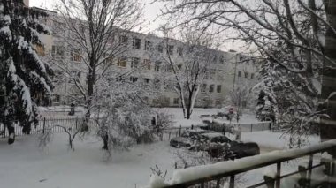 winter footage of a landscape with a snow-covered city