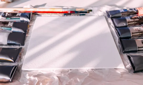 Clean Empty Canvas Panel Tubes Oil Paints Creative Space — стоковое фото