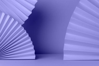 Very Peri abstract composition with textured paper fans. Mockup for product. Demonstration with copy space. Festive celebration backdrop. Very peri color spruce background.