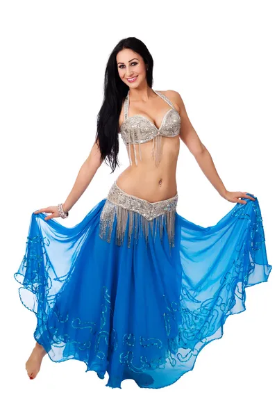 Beautiful belly dancer wearing a blue and silver costume. — Stock Photo, Image