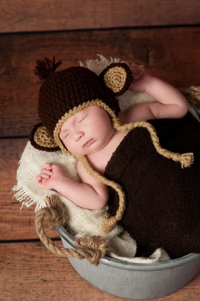 Newborn Baby Wearing a Monkey Hat — Stock Photo, Image