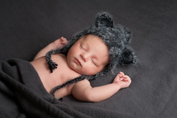 Newborn baby with wolf hat — Stock Photo, Image