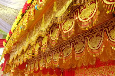 Jambi Traditional Wedding Stage motif made of gold thread embroidery