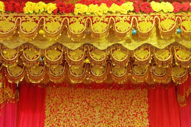 Jambi Traditional Wedding Stage motif made of gold thread embroidery