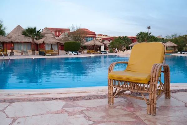 Chair near the pool — Stock Photo, Image