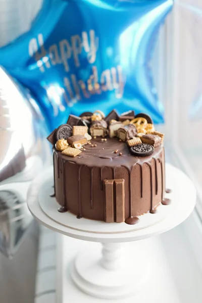 Chocolate Cake Various Sweets Blue Star Shaped Balloon Happy Birthday — Stock Photo, Image