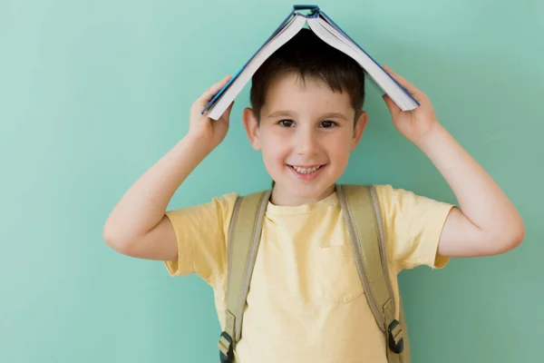 Caucasian Preschool Boy School Backpack Holds Book Light Green Background Stockbild