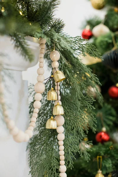 Christmas Fireplace Golden Vintage Decorations Green Spruce Wreath Bells Wooden — Zdjęcie stockowe