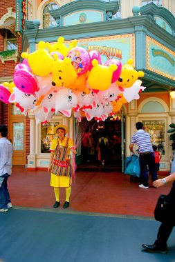 Tokyo Disneyland dynasty era Victorian-style street in the world market selling balloons girl clipart