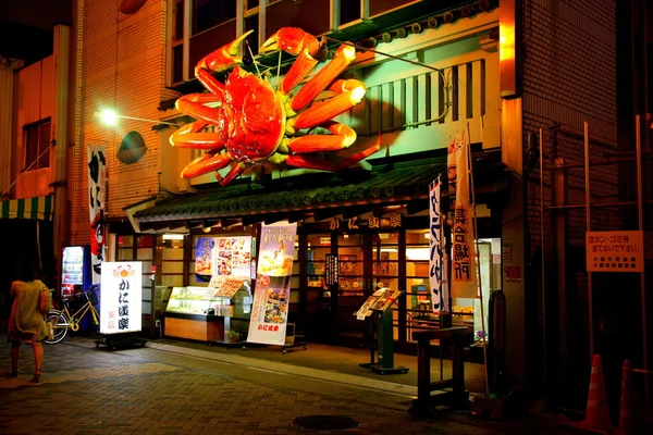 Shinsaibashi Osaka Dotonbori es la calle de comida más grande, gran signo de cangrejo es una señal de Dotonbori —  Fotos de Stock
