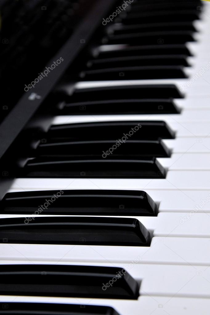 Music playing a musical instrument - piano keys
