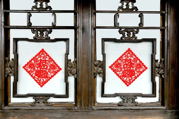 Rejillas de ventana cortadas en papel antigua ciudad de Pingyao en Shanxi —  Fotos de Stock