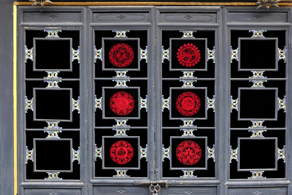 Rejillas de ventana cortadas en papel antigua ciudad de Pingyao en Shanxi —  Fotos de Stock