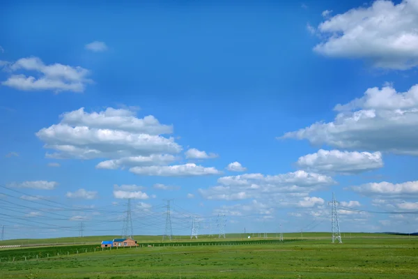 Inner Mongolia Hulunbeier Ewenki flag Yimin River prairie high voltage transmission lines — Stock Photo, Image