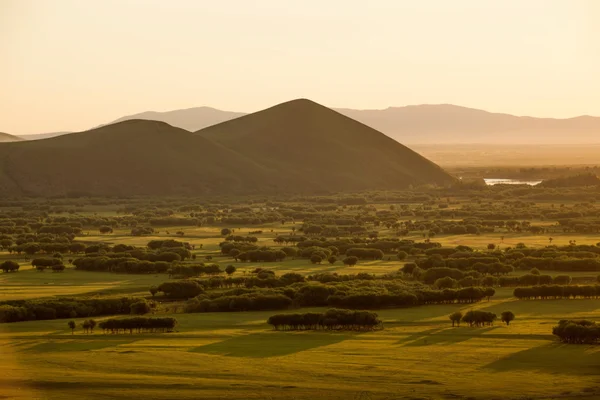 Inre Mongoliet hulunbeier förrut solnedgång rot floden våtmarker — Stockfoto