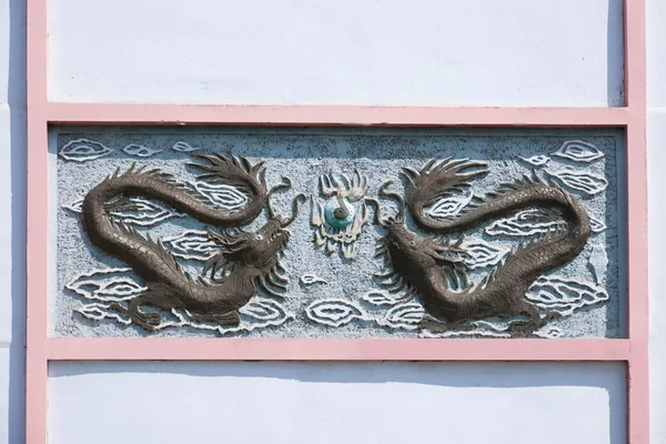 Inner Mongolia Hulunbeier Ergun gold town wall carving "Dragons" — Stock Photo, Image