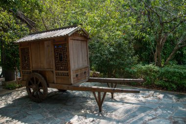 Shenzhen City, Guangdong Province, East Dameisha Tea Stream Valley Ancient Tea Town show ancient carriages clipart