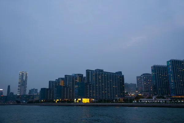 Zmierzch w kowloon, Hongkong port victoria — Zdjęcie stockowe