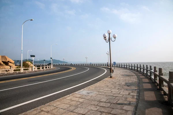 Road, zhuhai, guangdong par strandpromenaden — Stockfoto