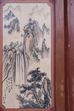 Gansu Dunhuang Folk Museum show houses murals on buildings clipart