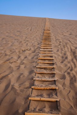Gansu Dunhuang Mingsha mountain desert ladder