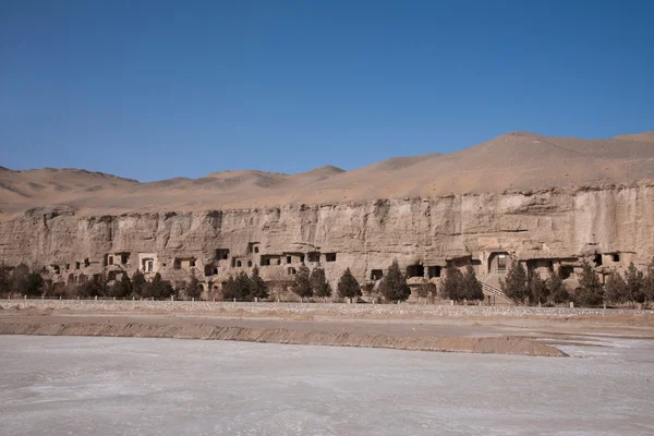 Dunhuang mogao-grotten rand wordt verlaten — Stockfoto