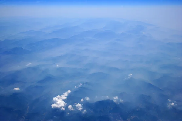 Nine thousand meters altitude overlooking the earth — Stock Photo, Image