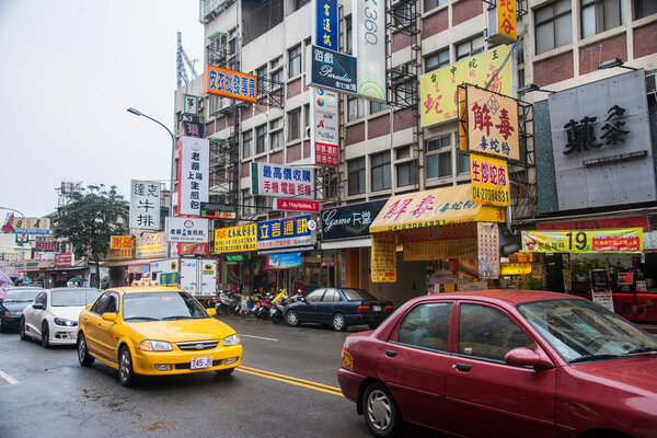 Taiwan's Feng Chia Night Market, Taichung, Taiwan Wenhua Road streetscape ago
