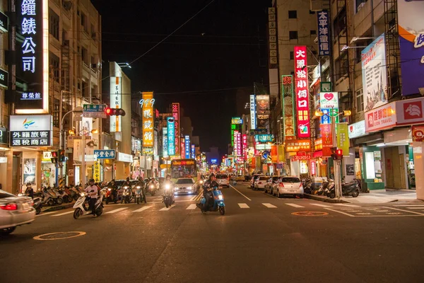 Taiwan 's Chiayi City street shops in the mountain night — стоковое фото