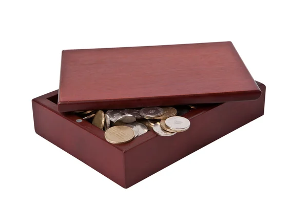 Monete in scatola di legno su sfondo bianco — Foto Stock