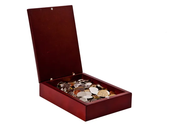 Coins in a finished wooden brown box — Stock Photo, Image