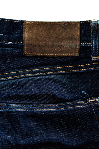 Textura jeans com rótulo — Fotografia de Stock