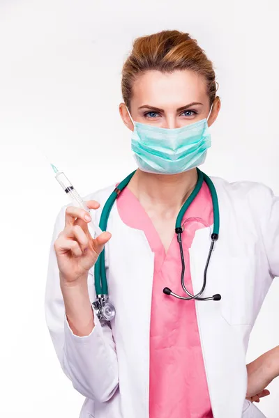 Charismatic young medic with syringe — Stock Photo, Image