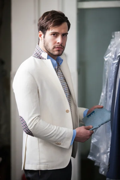 Portrait of a handsome young man at the store — Stock Photo, Image