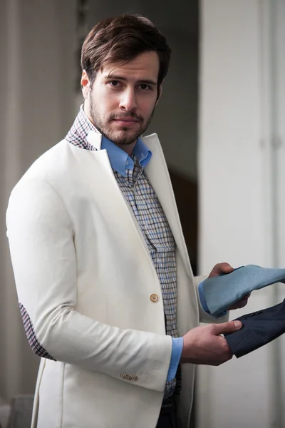 Portrait in profile of a handsome young man at the store — Stock Photo, Image