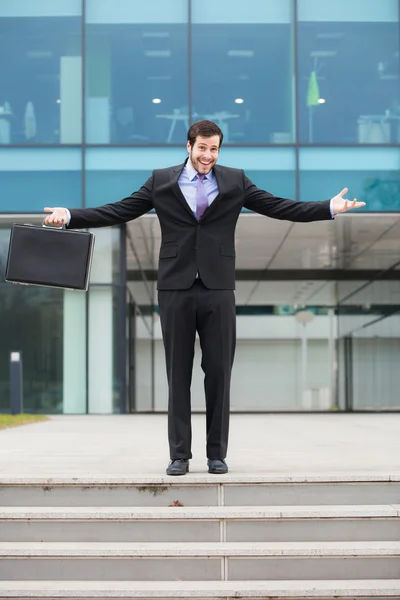 Happy businessman with hands open — Stock Photo, Image