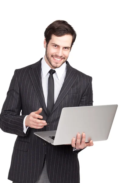 Handsome businessman with a laptop — Stock Photo, Image