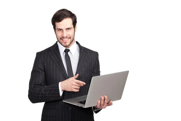 Confident businessman with a laptop — Stock Photo, Image