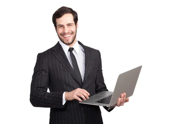 Smiling businessman with a laptop — Stock Photo, Image