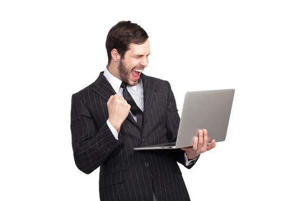 Very happy businessman with a laptop — Stock Photo, Image