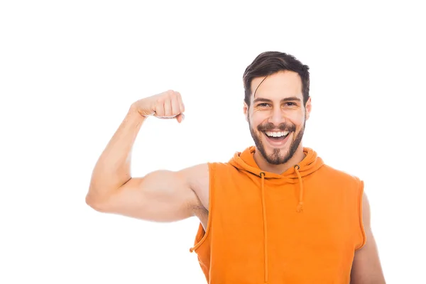 Улыбающийся мужчина с мускулами — стоковое фото
