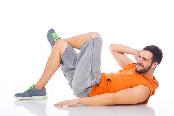 Young man doing exercises — Stock Photo, Image