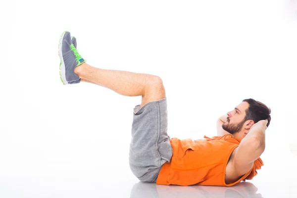 Jovem fazendo exercícios — Fotografia de Stock