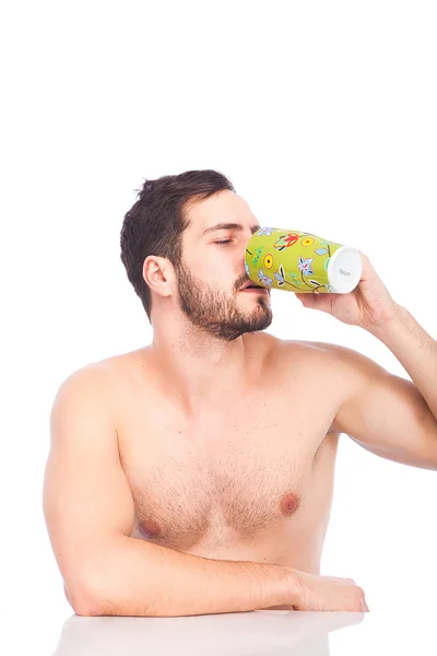 Man drinking cuffe without shirt — Stockfoto