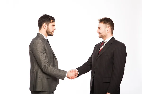 Estrechando la mano de dos hombres de negocios — Foto de Stock