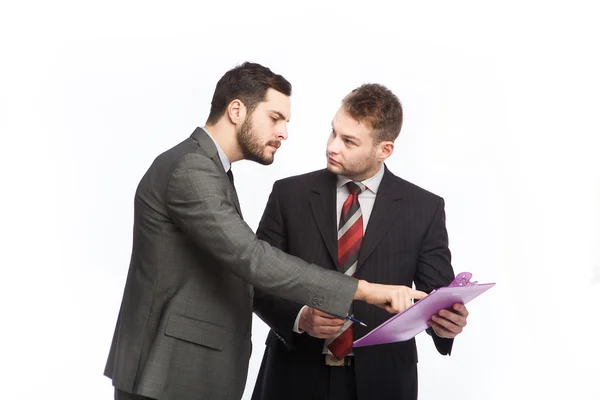 Businessman points the clipboard — Stock Photo, Image